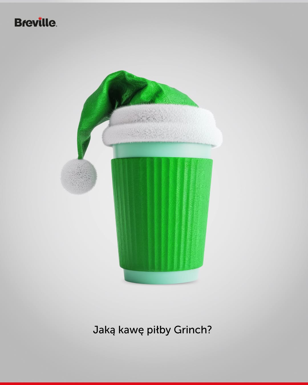 Kreacja Breville „Jaką kawę piłby Grinch?” — zielony kubek w czapce Grincha